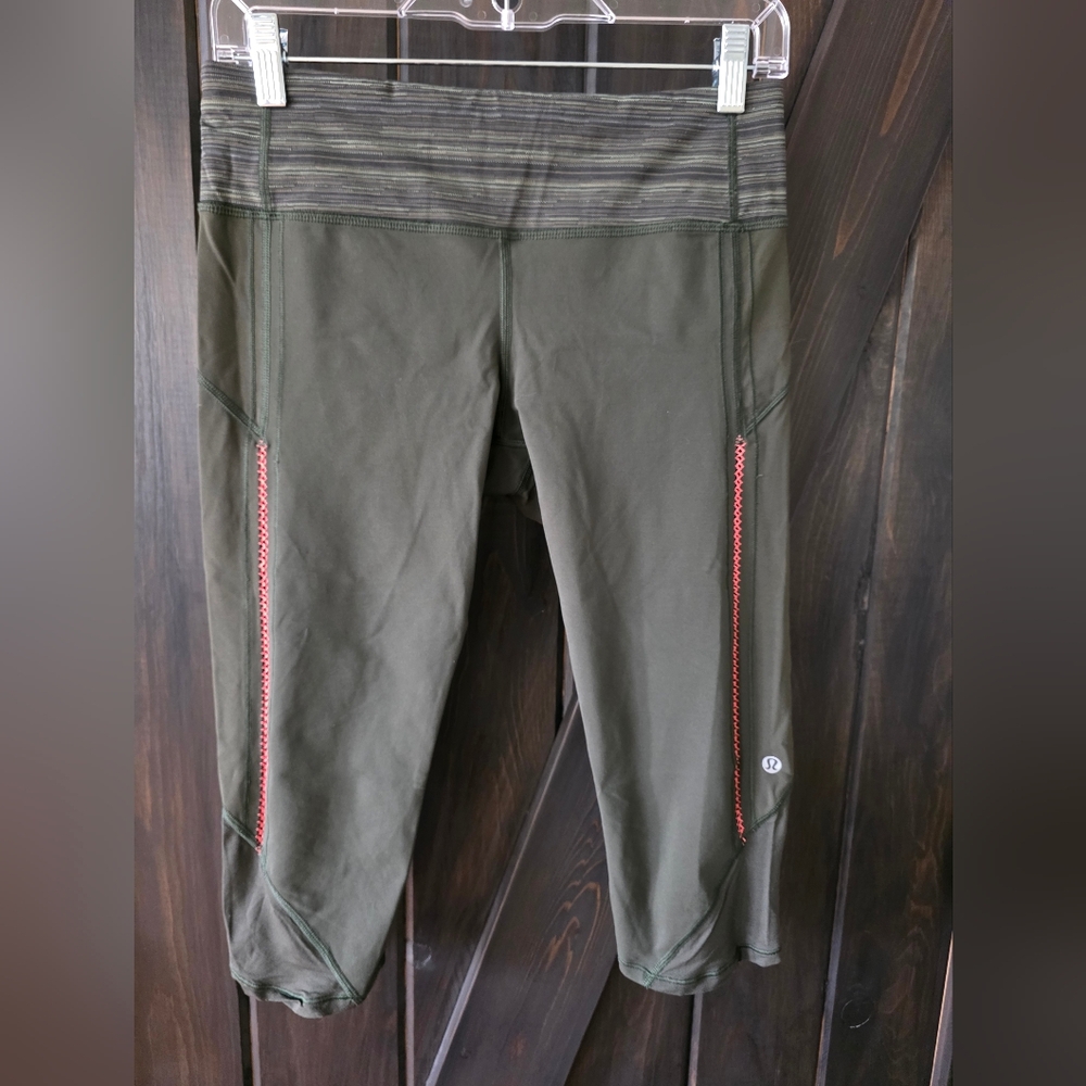 Lululemon Vintage Dark Green Cropped Leggings with Coral Stitching